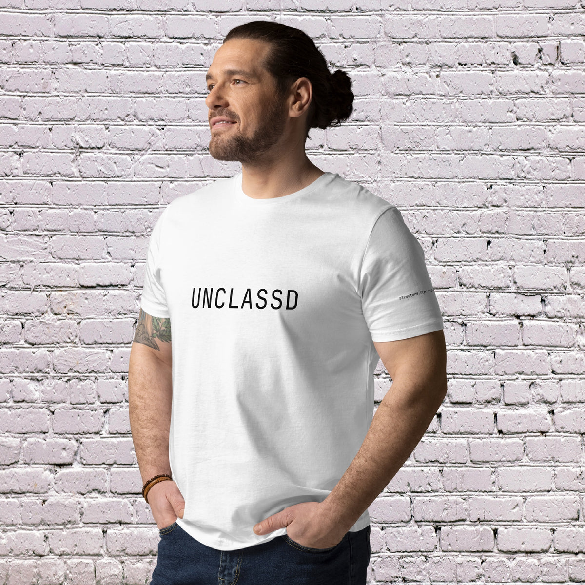 Male Model wearing UNCLASSD CORE Sand Tee during dance or rollerskate flow practice - face