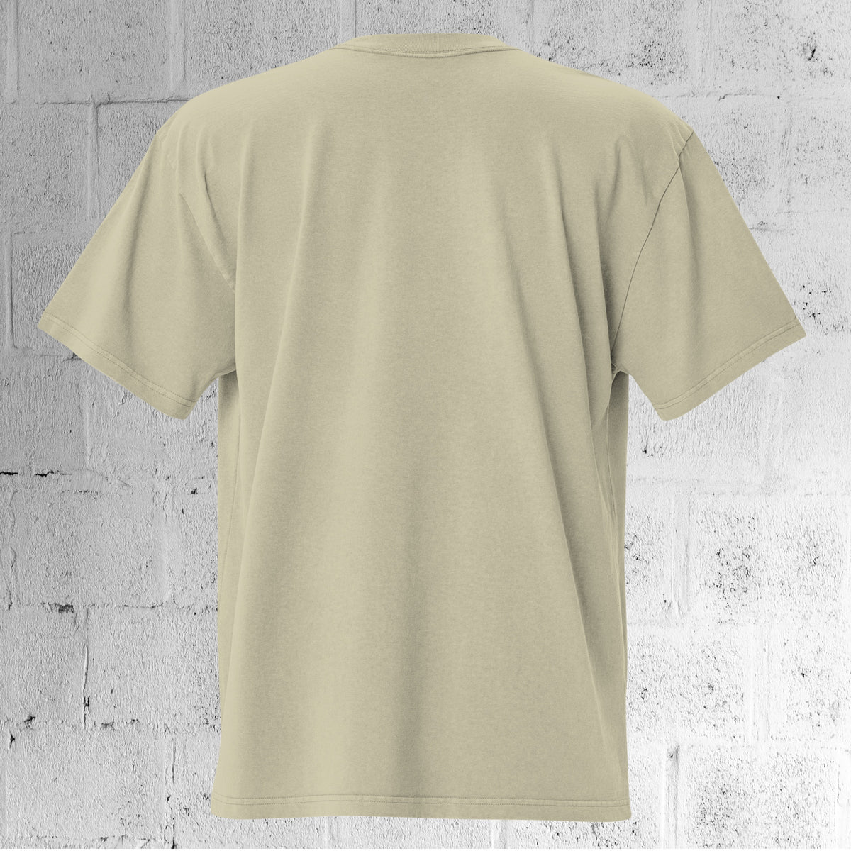Back view of the UNCLASSD CORE Oversized Tee in faded eucalyptus sage showing dropped shoulders and oversized fit.
