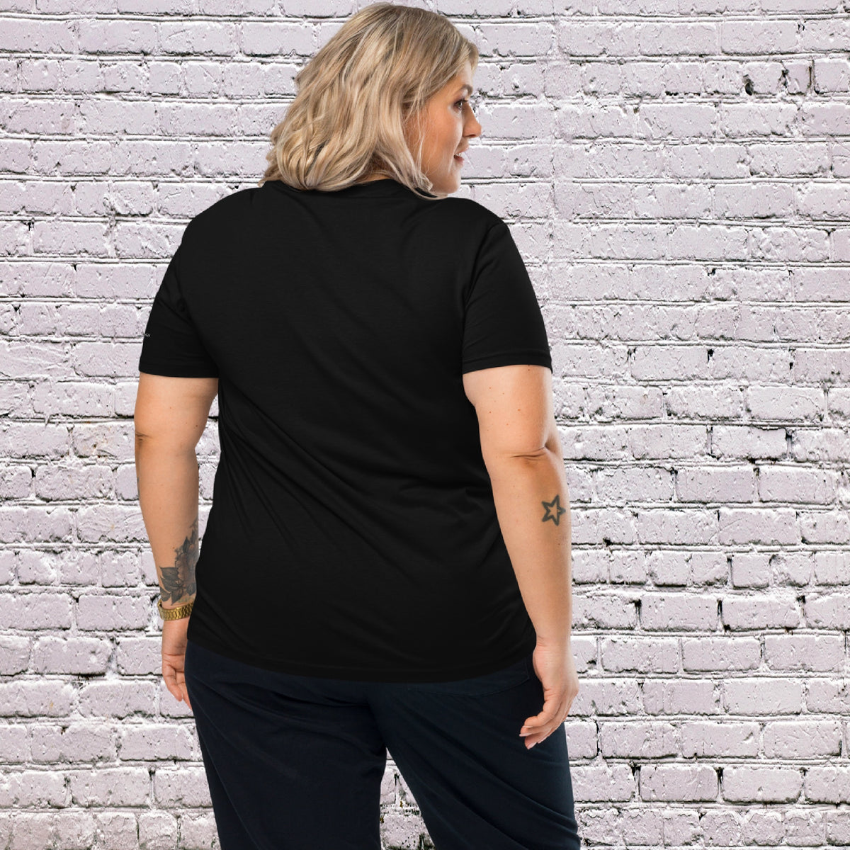 Woman Model wearing UNCLASSD CORE Black Tee for dance or rollerskate training - back

