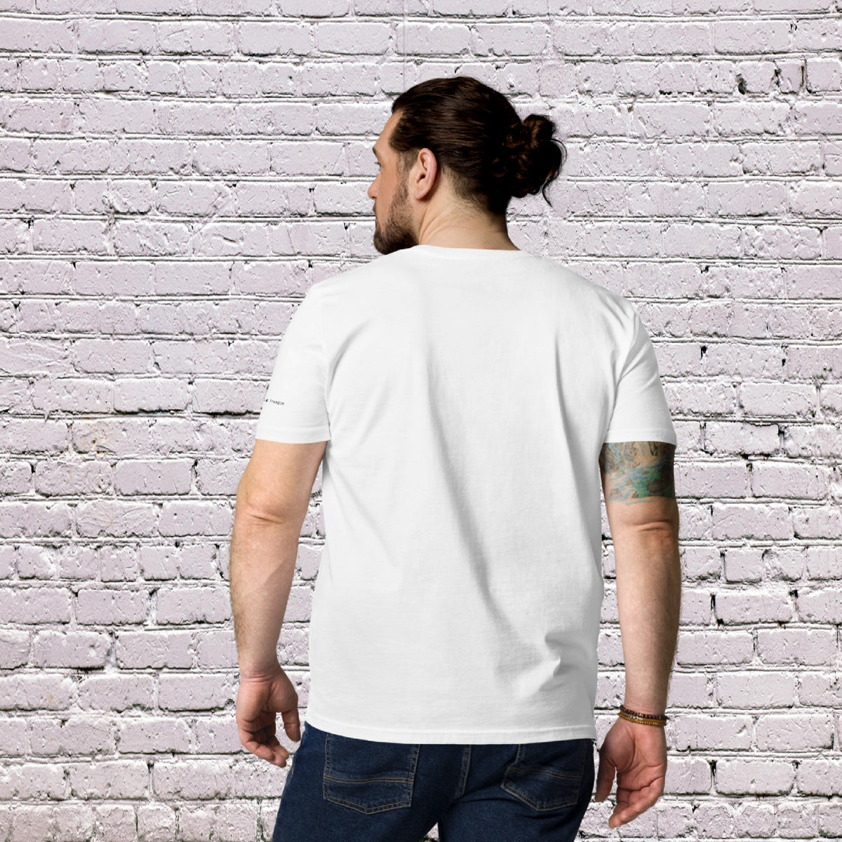 Male Model wearing UNCLASSD CORE Sand Tee during dance or rollerskate flow practice - back