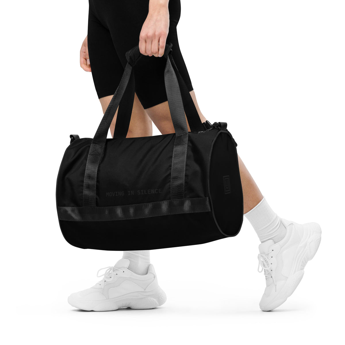 Model Round Dance Bag side view highlighting cylindrical form and balanced volume
