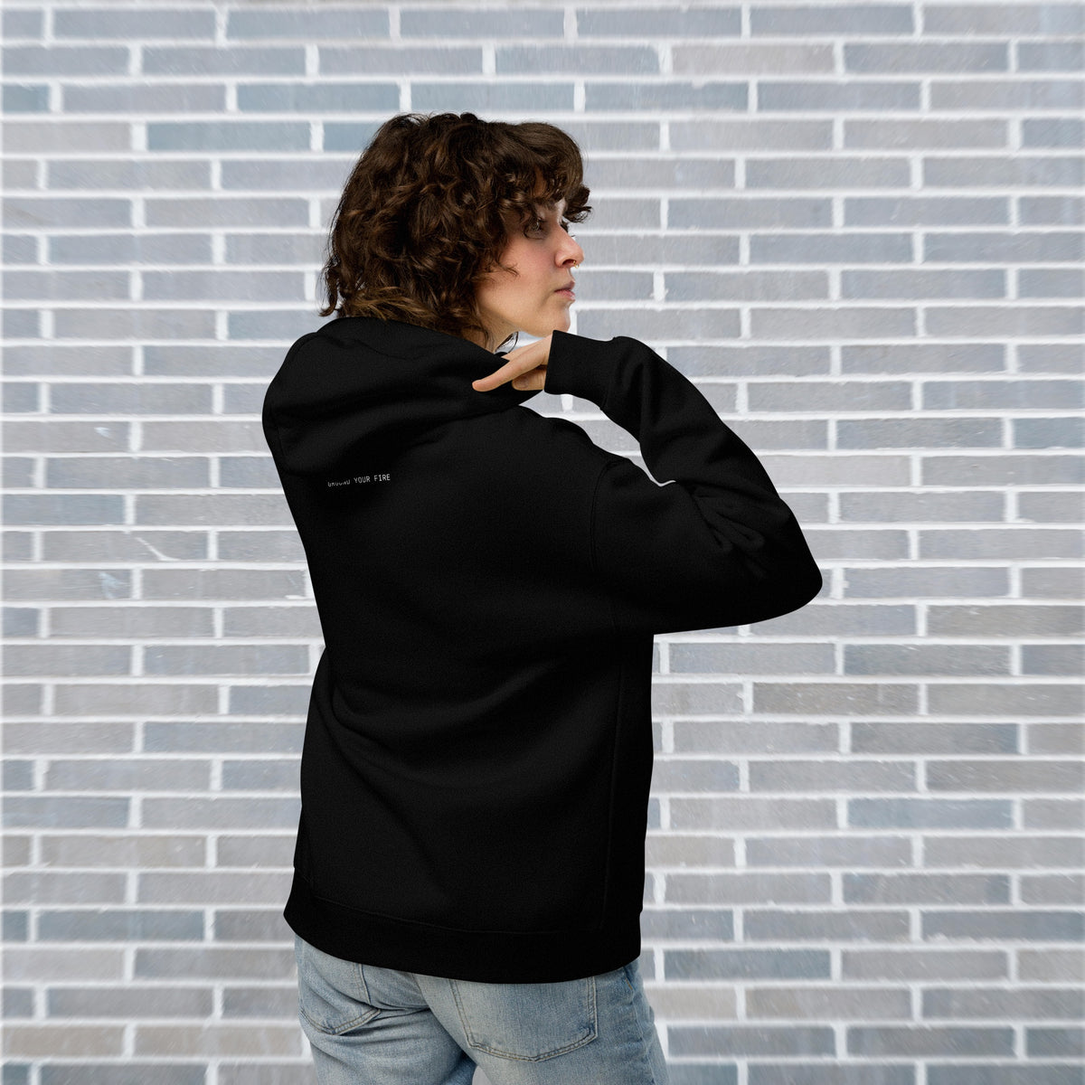 Female Dancer wearing UNCLASSD CORE oversized black hoodie for studio footwork and floorwork practices - back