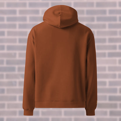 Clay CORE Hoodie back view with mantra Heat Reveals Shape — dancers & rollerskaters