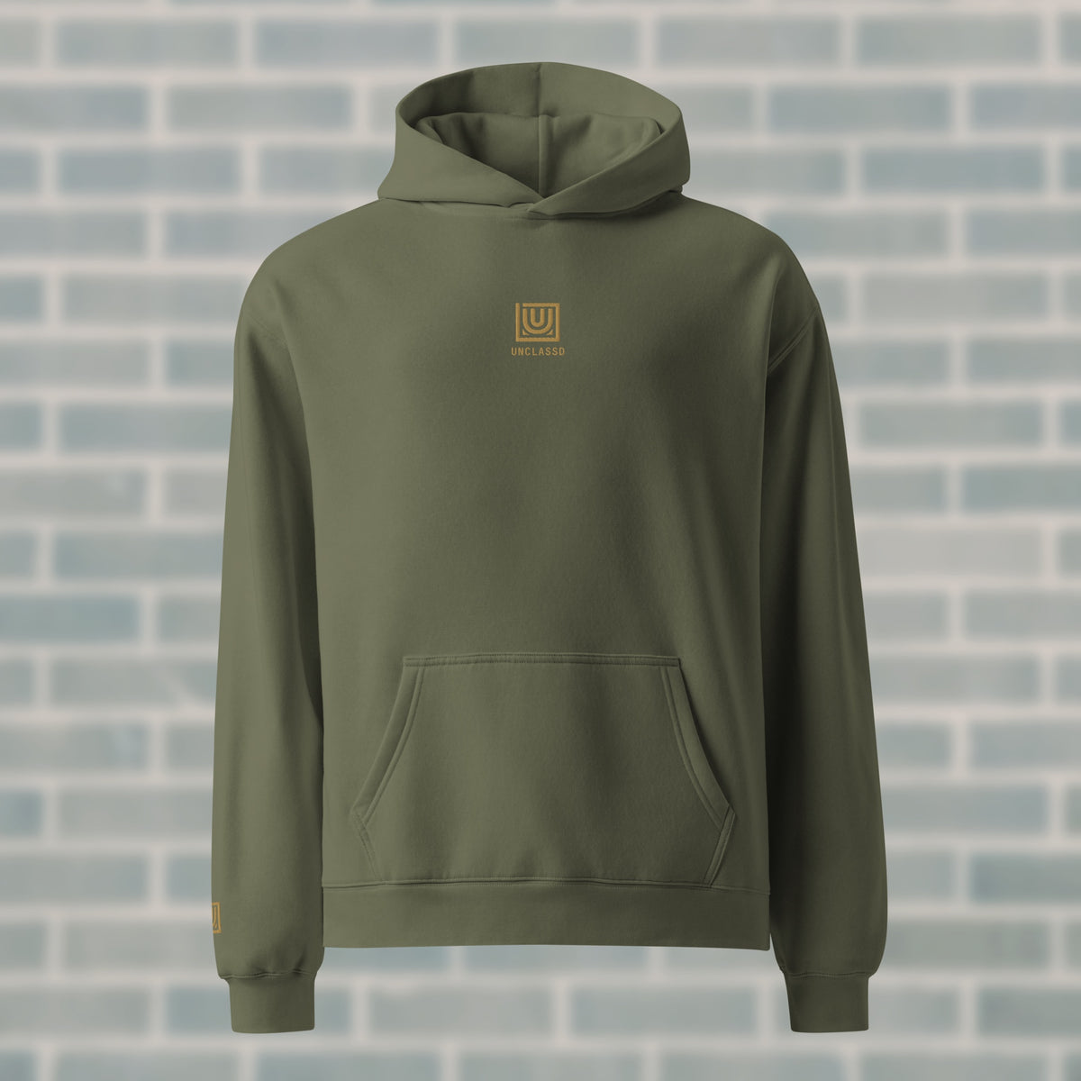 UNCLASSD Cypress Hoodie — premium oversized dance hoodie with centered gold embroidery and “GROUND MOVEMENT, GROUND MIND” mantra. Designed for dancers, rollerskaters, and movement training.