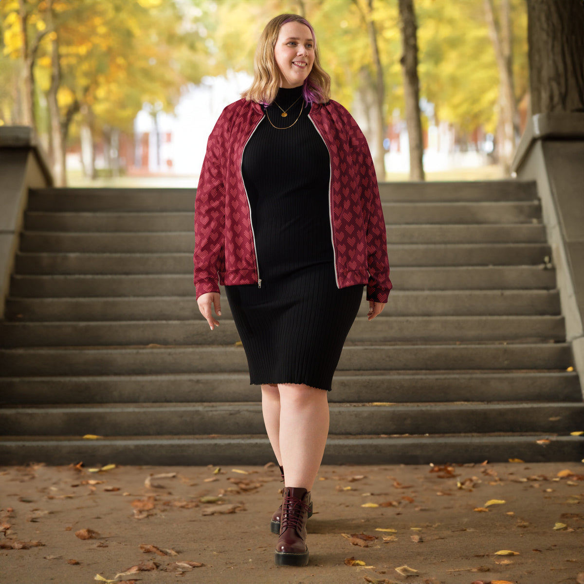 Model wearing a graphic fleece jacket with a relaxed unisex fit - pixel heart pattern