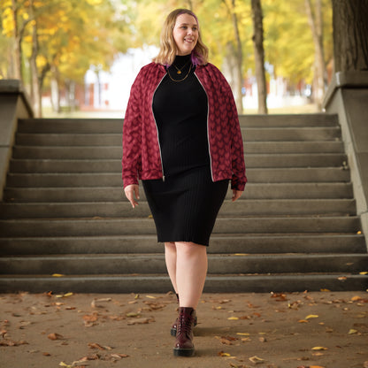 Model wearing a graphic fleece jacket with a relaxed unisex fit - pixel heart pattern