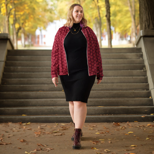 Model wearing a graphic fleece jacket with a relaxed unisex fit - pixel heart pattern