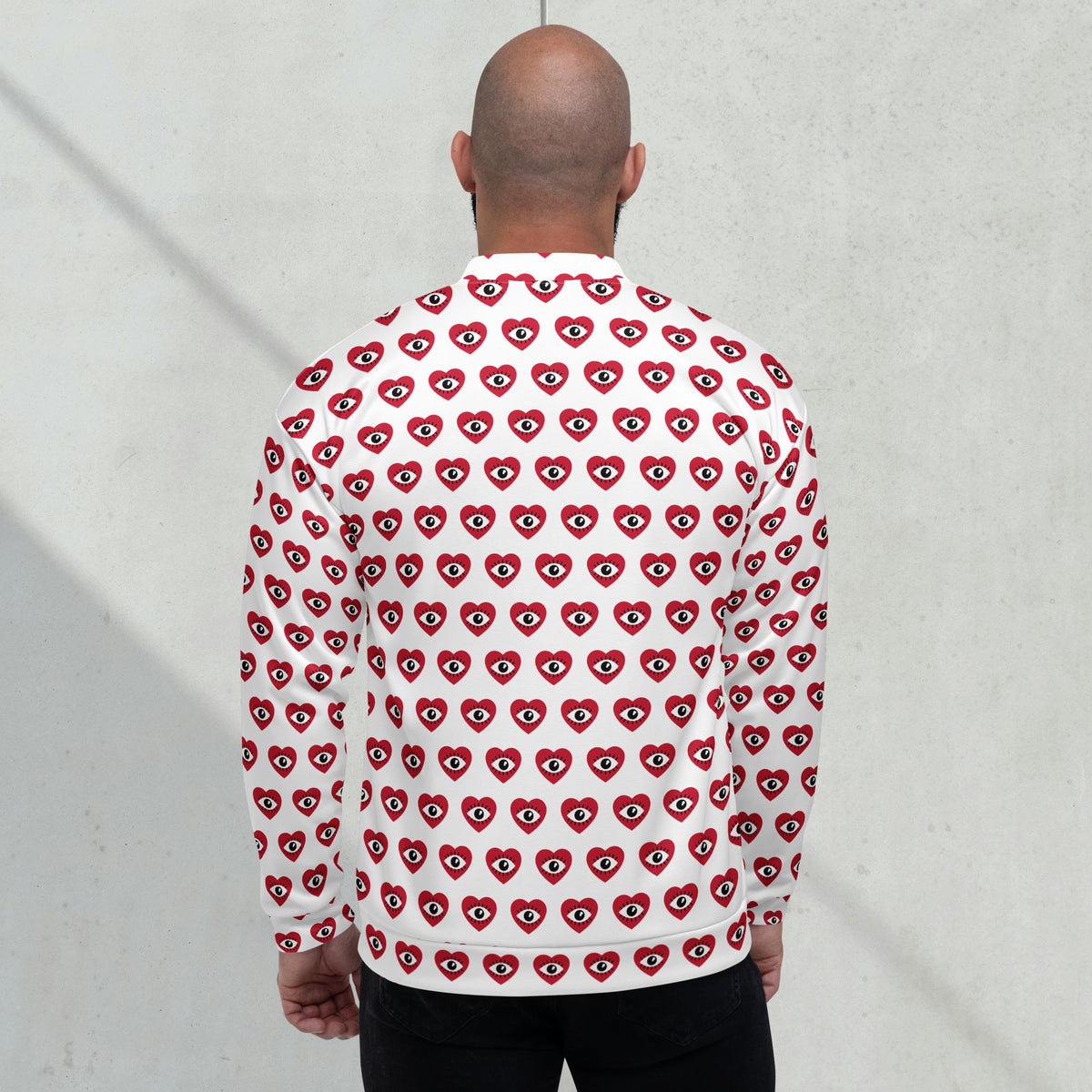 Model wearing a heart graphic fleece jacket with a relaxed unisex fit - back