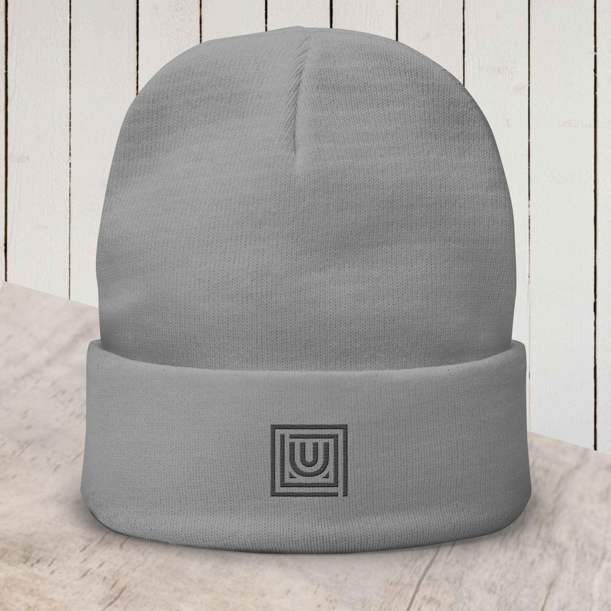 Grey beanie with embroidered monogram designed for dance and studio wear