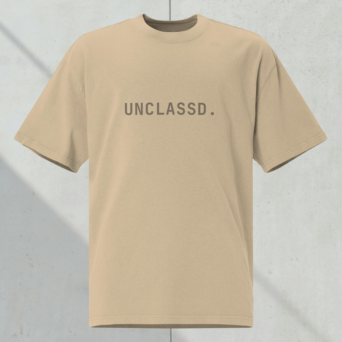 Front view of the UNCLASSD CORE Oversized Tee, heavyweight 240gsm cotton, tonal chest print, boxy silhouette