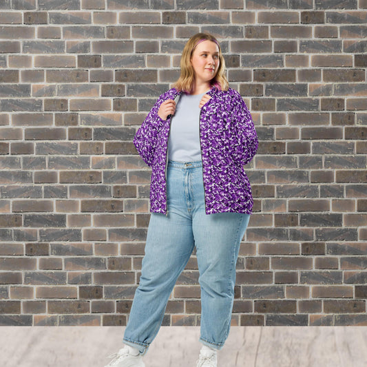 Model wearing a relaxed unisex purple camouflage fleece jacket with a streetwear outfit
