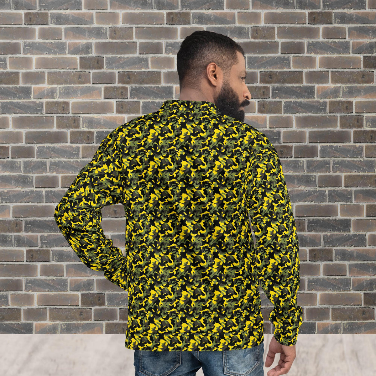 Model wearing a relaxed unisex yellow camouflage fleece jacket with a streetwear outfit